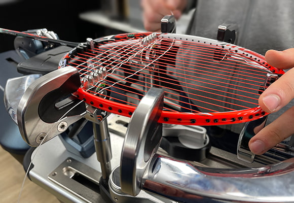 besaitung-badminton-tennis-squash-bespannung
